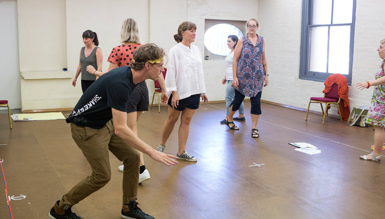 Teachers performing activity at Regional Teacher Mentorship in Sydney at Bell Shakespeare performance space
